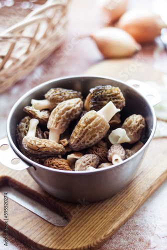 Spring Morel mushrooms in a metal bowl.