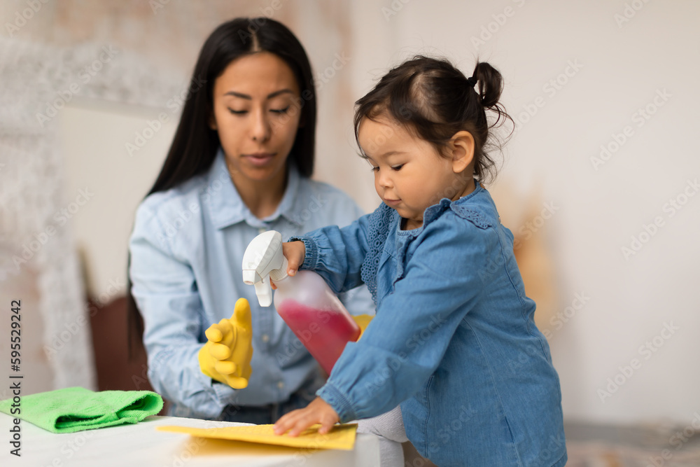 Korean Child And Mother Cleaning Using Detergent Wearing Gloves Indoor Korean Child And Mother Cleaning Using Detergent Wearing Gloves Indoor