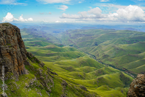 View from Lesotho's Sani Pass over the green foothills of the Drakensberg, South Africa photo