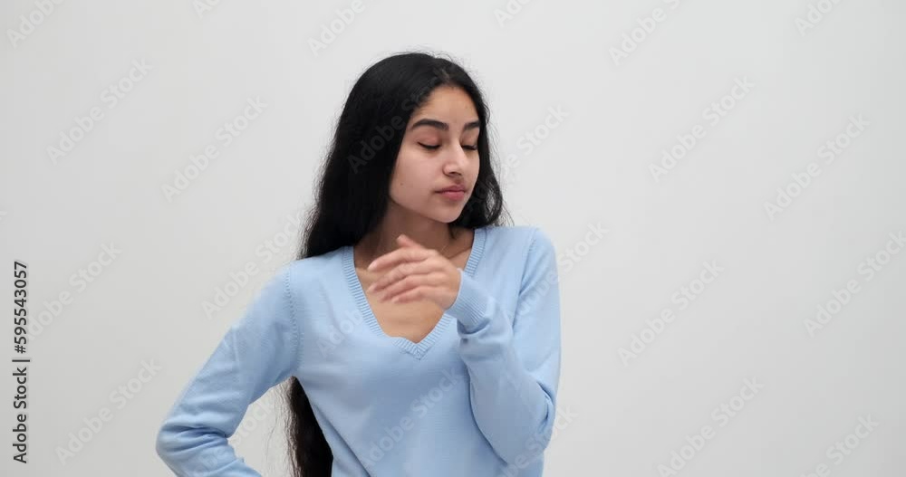 Tired woman yawning covering open mouth with hand Tired woman yawning covering open mouth with hand