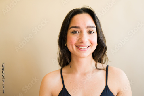 Smiling attractive young woman looking happy