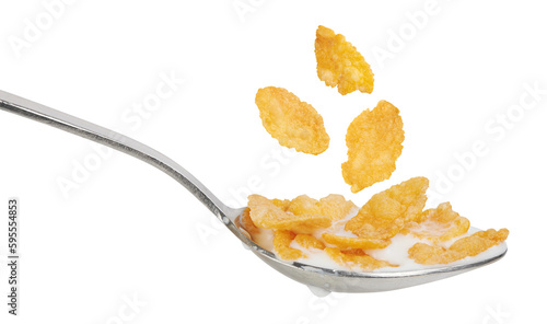 Corn flakes with milk in a spoon