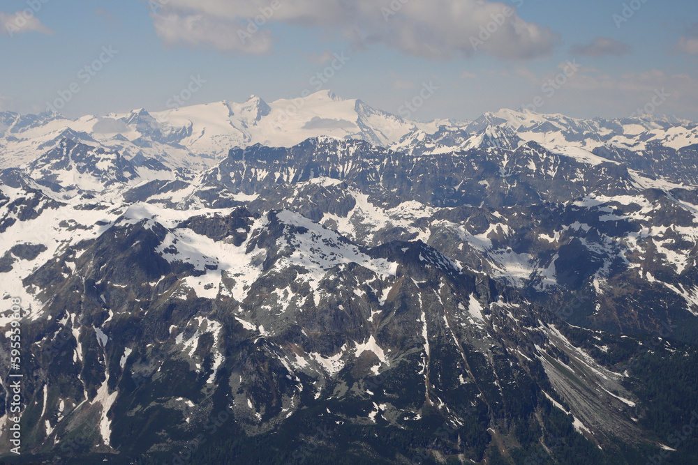 Fototapeta premium Panorama opening from Kitzsteinhorn, sky resort slope, Kaprun, Austria