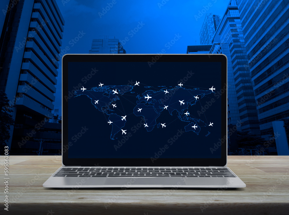 Foto de Flight routes airplanes connection and world map on laptop