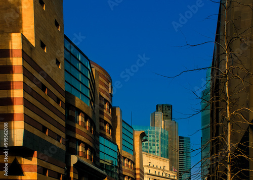 buildings in the city London under blue sky