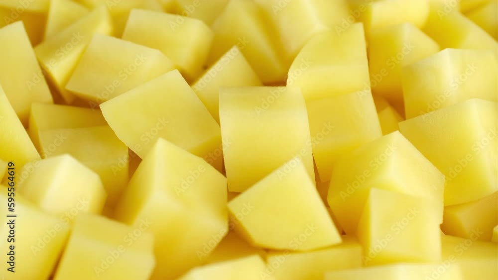 Chopped potatoes close up. Process cooking potato Chopped potatoes close up. Process cooking potato