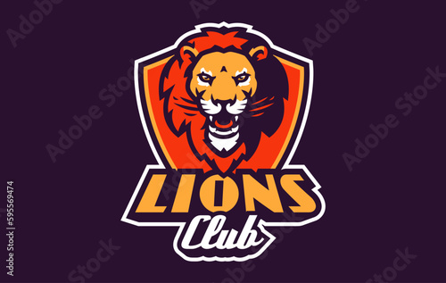 Sports logo with lion mascot. Colorful sport emblem with lion  leo mascot and bold font on shield background. Logo for esport team  athletic club  college team. Isolated vector illustration
