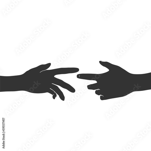 Human hands reaching out to one another, almost touching. Help concept