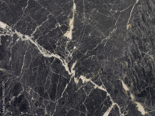 Patterned nature of dark gray marble texture with beige stripes