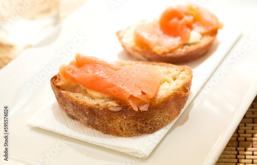 delicious salmon fillet canapes on slices of fresh bread