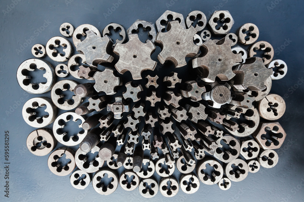 Taps and dies for metal threading. Tools for cutting external and