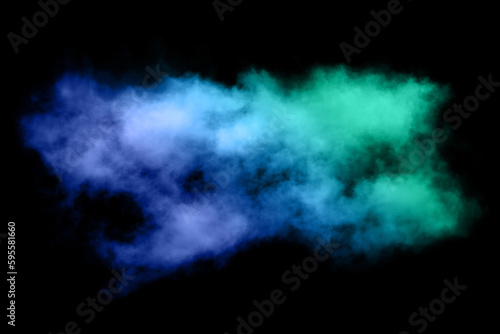 Colored powder explosion on black background. Freeze motion of colored powder explosion isolated.