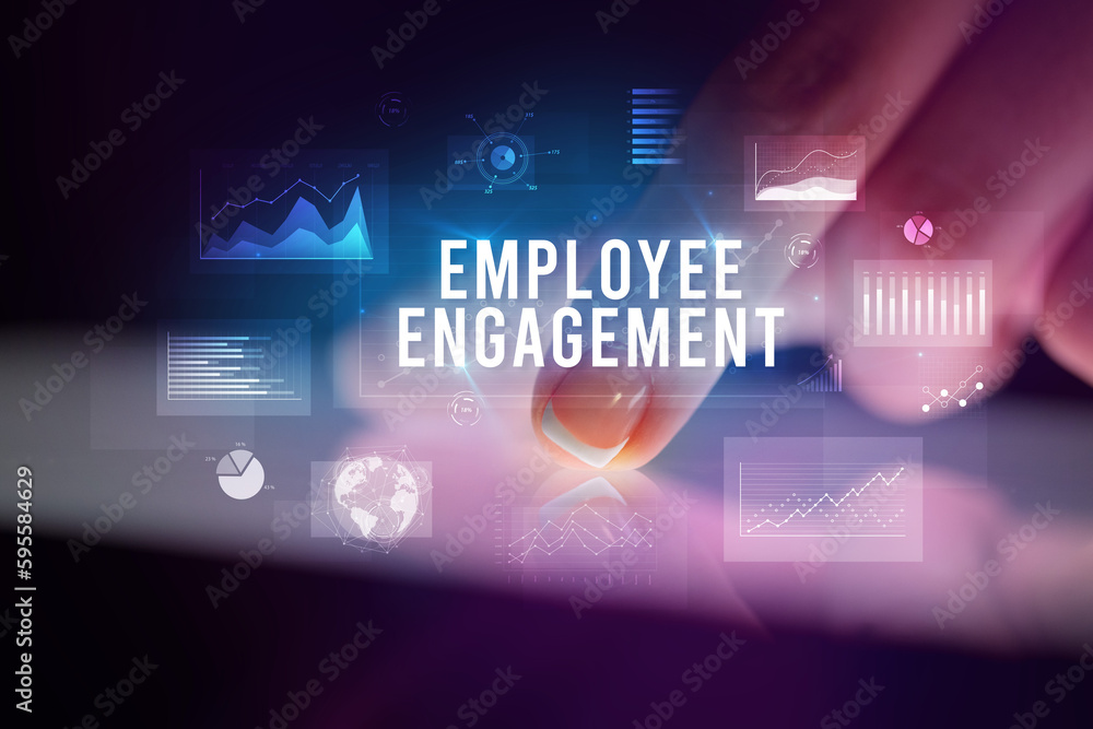 Finger touching tablet with business graphs and icons concept Finger touching tablet with business graphs and icons concept