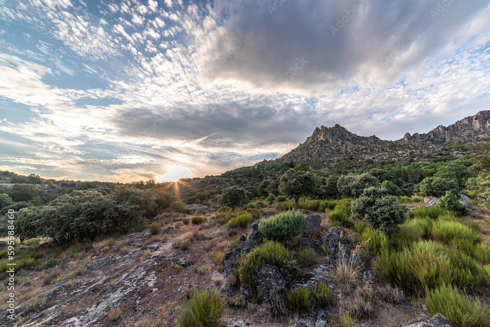 Obraz premium Cancho Gordo or Cancho de la Cruz, sunset photograph of the highest peak of the Sierra de la Cabrera, Madrid