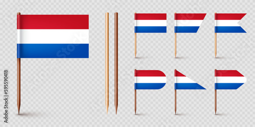 Realistic various Dutch toothpick flags. Souvenir from Netherlands. Wooden toothpicks with paper flag. Location mark, map pointer. Blank mockup for advertising and promotions. Vector illustration