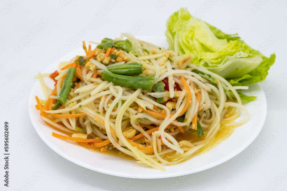 Thai Style Som Tum Papaya Salad on a White Plate