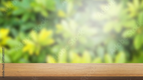 empty wooden table top in foreground with blurred green nature garden background used as product displayed. perspective brown wood table.
