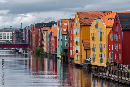 Beautiful view of the colorful wooden buildings of Trondheim Canal, Norway