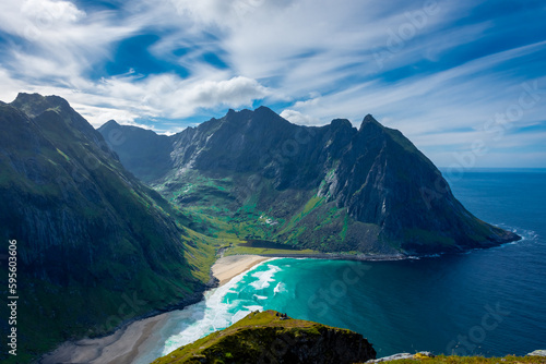 View over the turquoise water of Kvalvika Beach from Ryten Mount, Lofoten Islands, Norway