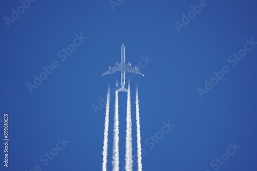 Airbus A340 flying at altitude over head on its way to USA from Germany photo