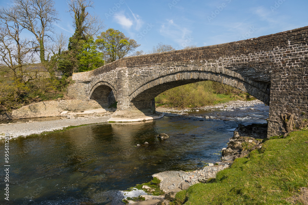 A stone bridge over the Rawthey River in Sedbergh. Yorkshire, UK.