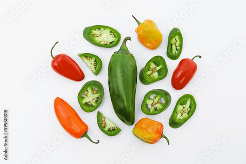 Wallpaper Mural Different hot chili peppers on white background, flat lay Torontodigital.ca