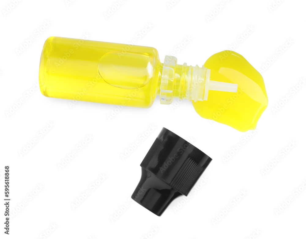 Bottle of yellow food coloring on white background, top view Bottle of yellow food coloring on white background, top view