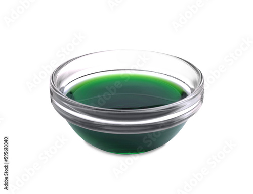 Glass bowl with green food coloring isolated on white