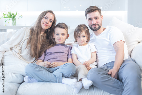 Young parents with children at home