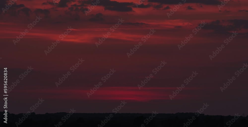 Stunning sunset over the horizon with clouds in the evening sky
Stunning sunset over the horizon with clouds in the evening sky