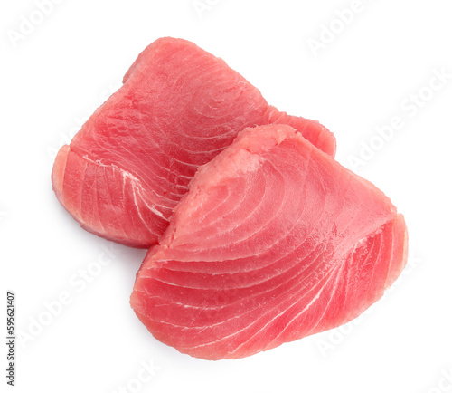 Two raw tuna fillets on white background, top view