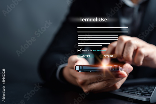 Businessman Sign Terms of use concept, reading terms and conditions of website or service before clicking button agree. Terms and conditions of contract