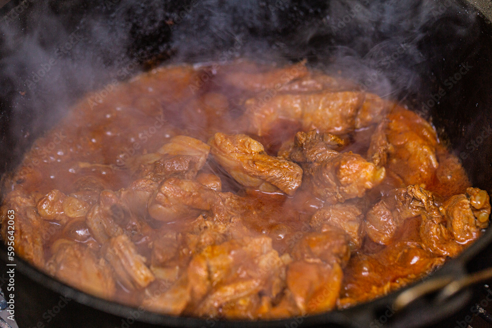 Hungarian goulash prepared on the grill. Close up Hungarian goulash prepared on the grill. Close up