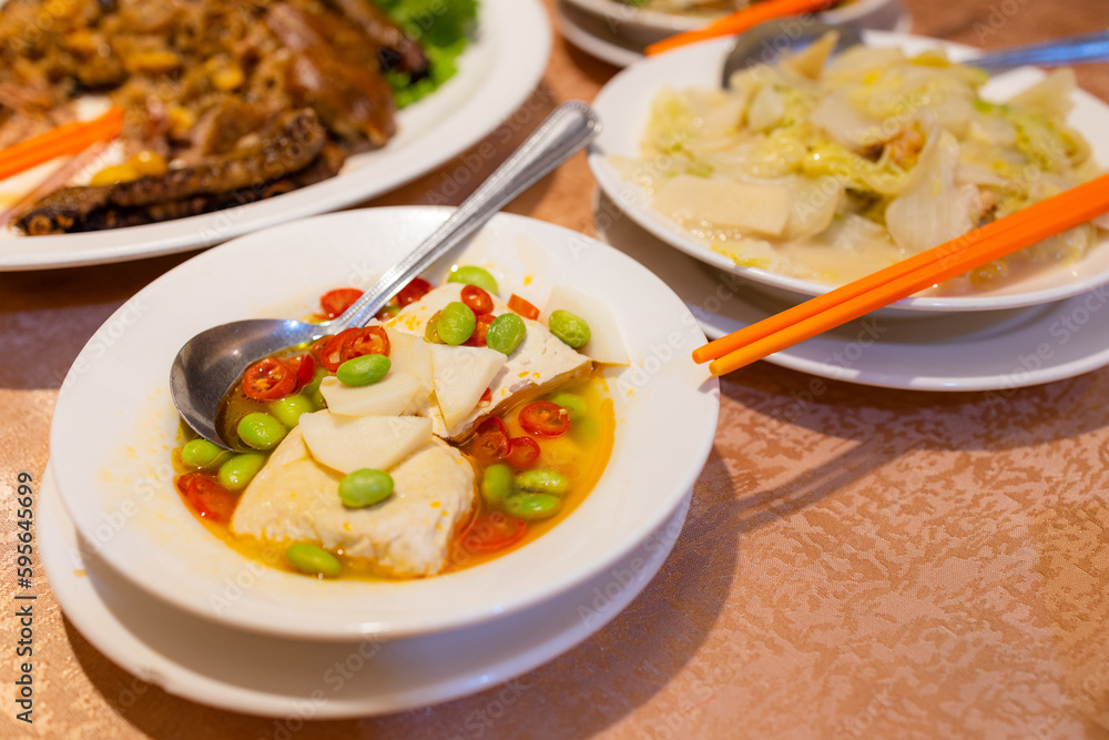 Chinese style stinky tofu with lots of others dishes in restaurant Chinese style stinky tofu with lots of others dishes in restaurant