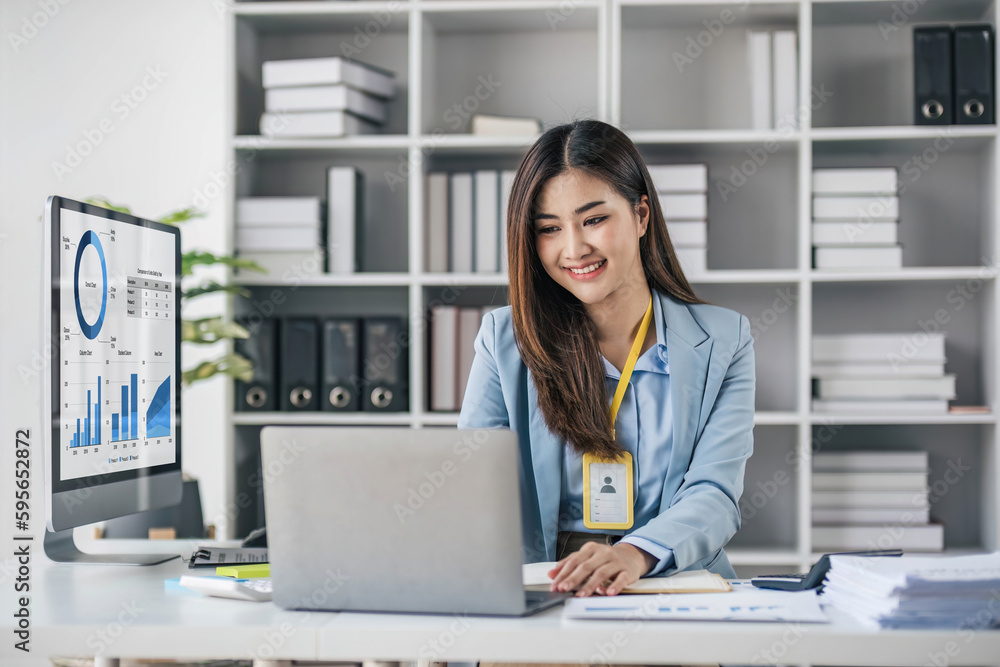 Business woman using calculator for do math finance on wooden desk in office and business working background, tax, accounting, statistics and analytic research concept.. Business woman using calculator for do math finance on wooden desk in office and business working background, tax, accounting, statistics and analytic research concept..