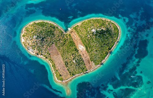 Aerial view of the heart shaped Galesnjak island on the adriatic coast, Zadar, Croatia. Heart shaped island of Galesnjak in Zadar archipelago aerial view, Dalmatia region of Croatia.