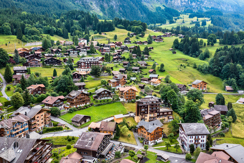 Townscape of village of Wengen on the edge of Lauterbrunnen Valley. Traditional local houses in Wengen village in the Interlaken district in the Bern canton of Switzerland.