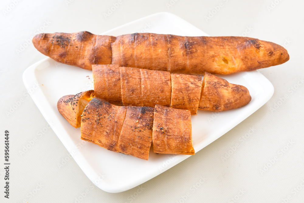 Turkish style meat stuffed filo dough borek served kol boregi. Cheese and minced pie are sliced on a marble background. Turkish name: Kol Boregi, ispanakli, kiymali, Su Boregi Turkish style meat stuffed filo dough borek served kol boregi. Cheese and minced pie are sliced on a marble background. Turkish name: Kol Boregi, ispanakli, kiymali, Su Boregi