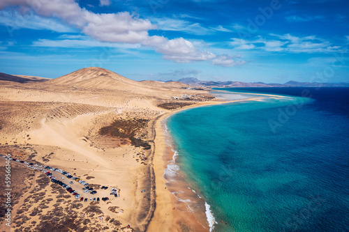 View on the beach Sotavento with golden sand and crystal sea water of amazing colors on Costa Calma on the Canary Island Fuerteventura, Spain. Beach Playa de Sotavento, Canary Island, Fuerteventura.