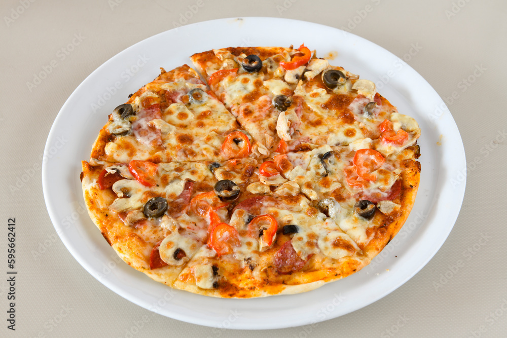 Delicious mixed pizza with rich content. Menu concept of choice and diversity. Karisik pizza Delicious mixed pizza with rich content. Menu concept of choice and diversity. Karisik pizza