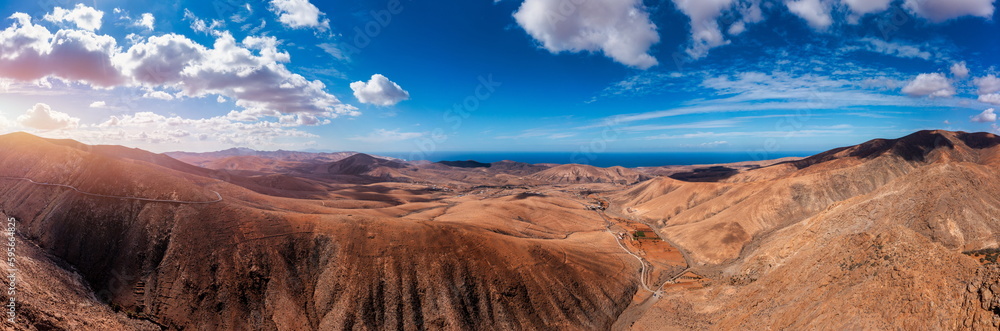 Naklejka premium Betancuria National Park on the Fuerteventura Island, Canary Islands, Spain. Spectacular view of the picturesque mountain landscape from the drone of the Betancuria National Park in Fuerteventura