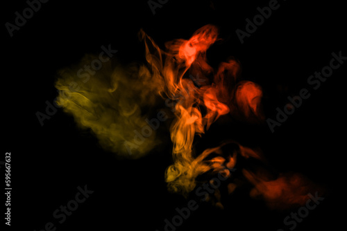 Abstract blue and red smoke steam moves on a black background. The concept of aromatherapy. © Philip