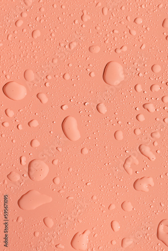 Beautiful pink background with water drops.