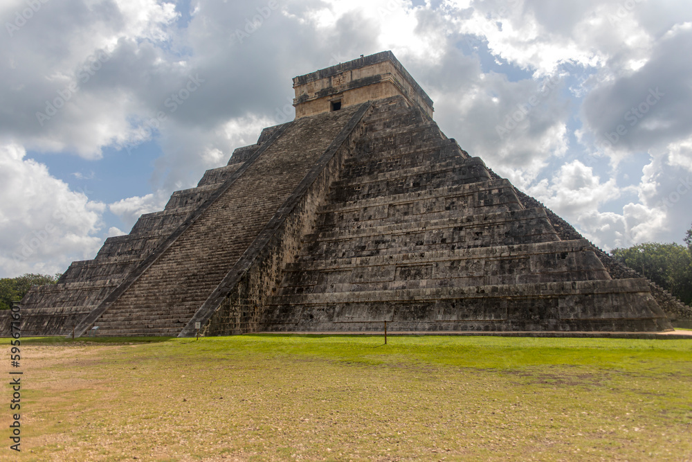 The Castle (Temple of Kukulkan) of Chichen Itza, Mayan pyramid in Yucatan, Mexico. Travel concept. Mayan ruins and civilization.