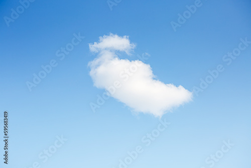 Gorgeous sky background with white fluffy clouds in the sunny day.