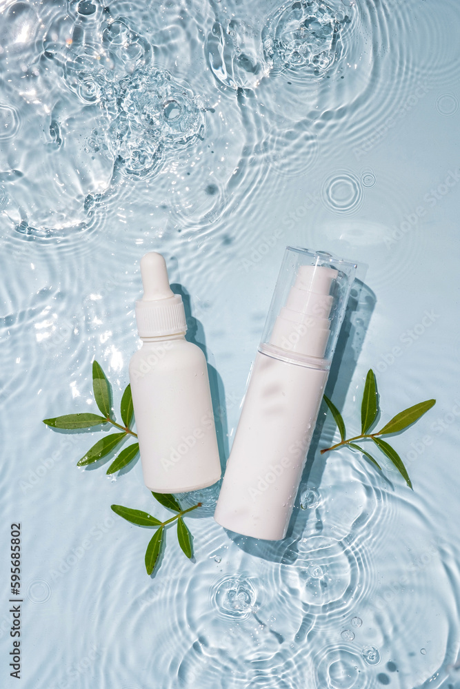 White bottle flacon cosmetics beauty product in water drop White bottle flacon cosmetics beauty product in water drop