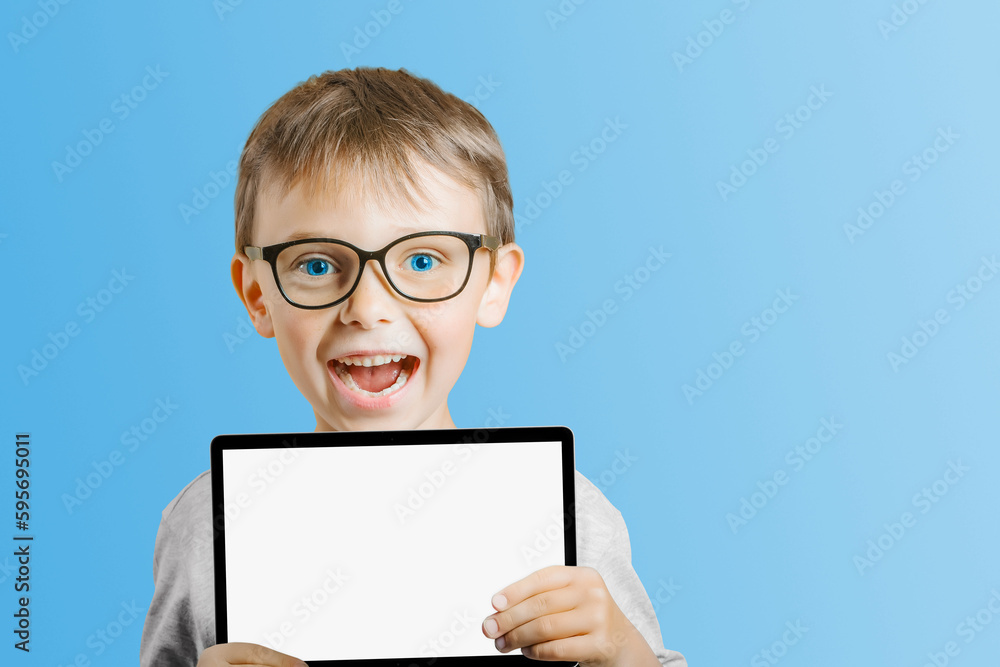 a Happy child boy holding a tablet on png background