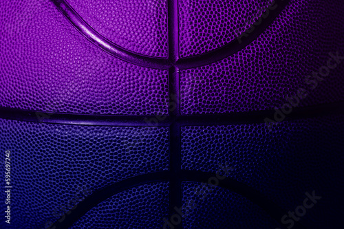 Closeup detail of blue and violet basketball ball texture background. Horizontal sport theme poster, greeting cards, headers, website and app © Augustas Cetkauskas