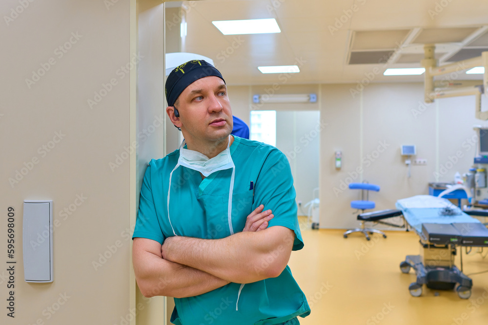 surgeon is standing near the operating room surgeon is standing near the operating room