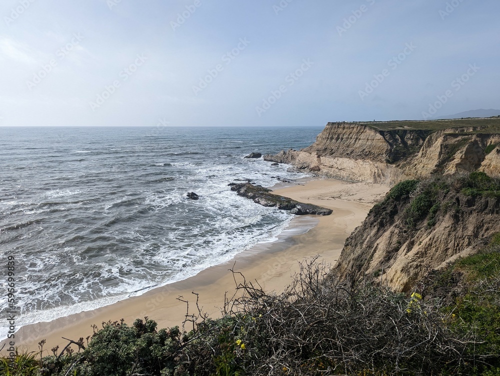 view of the coastal cliffs over the Pacific Ocean in Half Moon Bay, California
